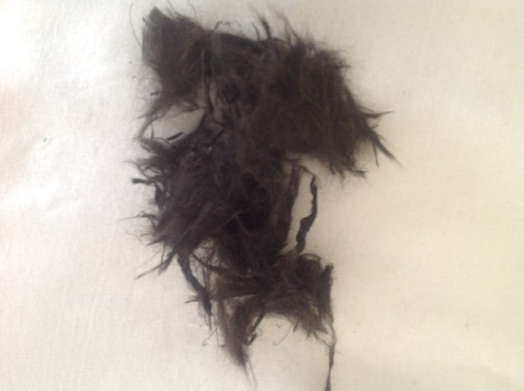 Pelusero de asbesto que salio del motor